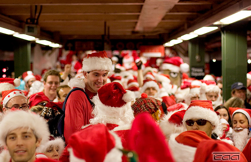 Santas take the subway